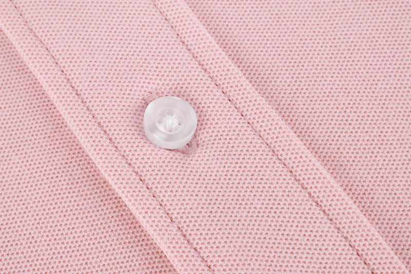 British menswear The Gent Richmond long sleeved shirt in pink with navy Gent logo button close up view