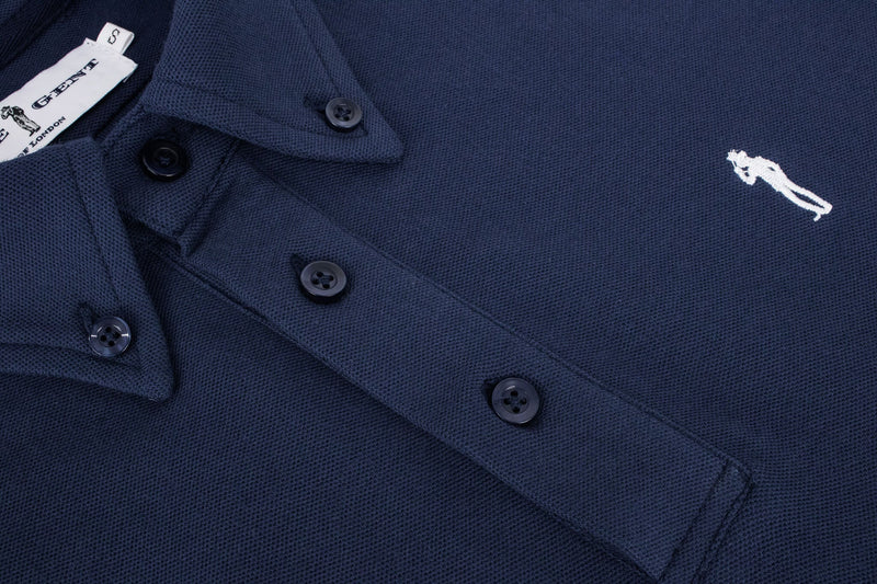 British menswear The Gent Wimbledon short sleeved polo shirt in navy with white Gent logo close up view