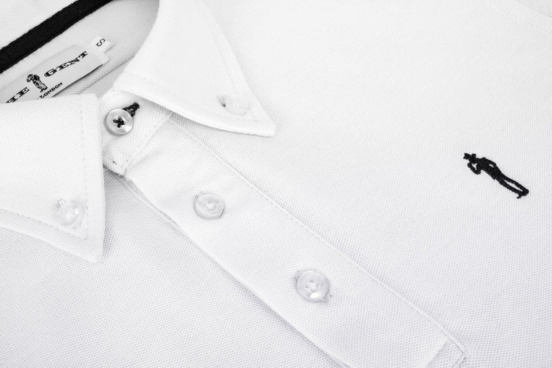 British menswear The Gent Wimbledon short sleeved polo shirt in white with navy Gent logo close up logo view